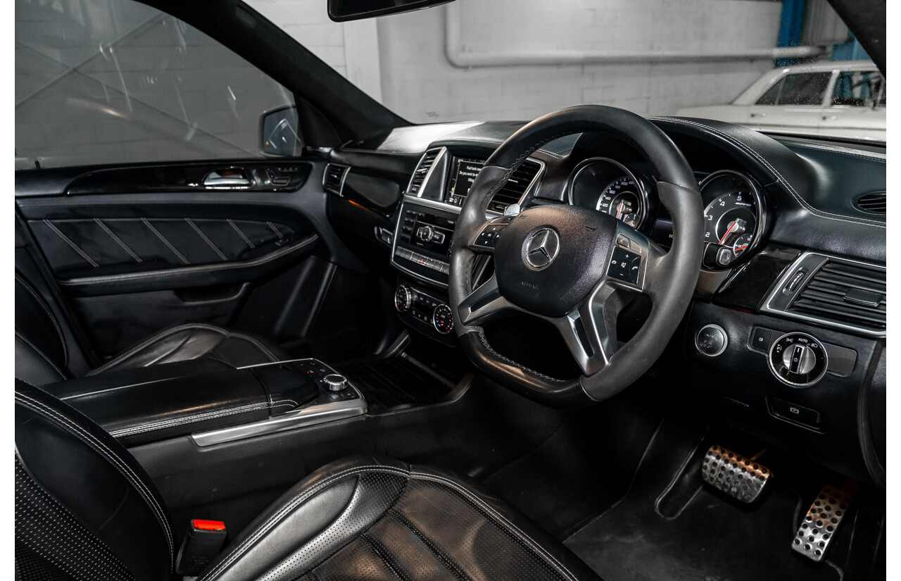 4/2014 Mercedes Benz ML63 AMG (4x4) W166 4d Wagon Diamond White Metallic Twin Turbo V8 5.5L