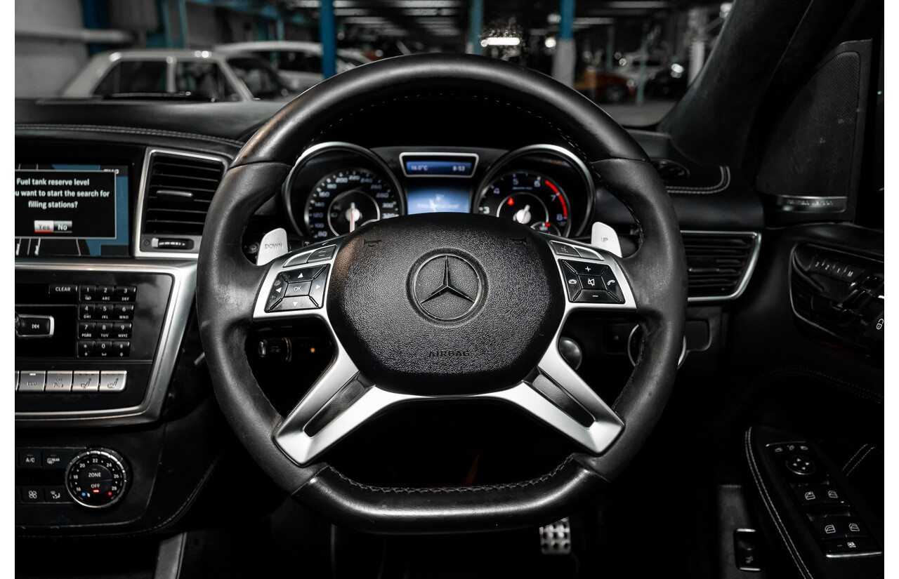 4/2014 Mercedes Benz ML63 AMG (4x4) W166 4d Wagon Diamond White Metallic Twin Turbo V8 5.5L