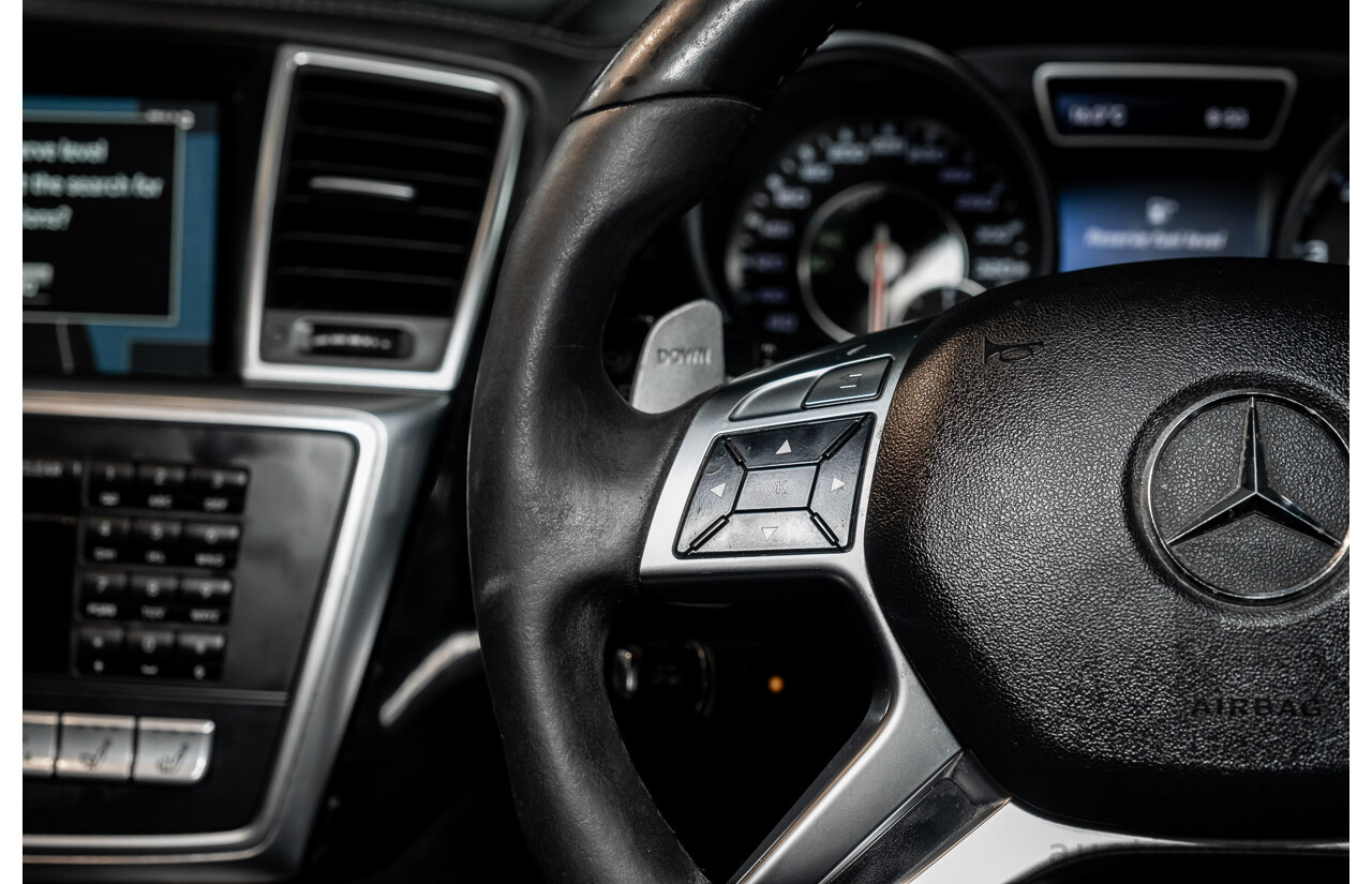 4/2014 Mercedes Benz ML63 AMG (4x4) W166 4d Wagon Diamond White Metallic Twin Turbo V8 5.5L