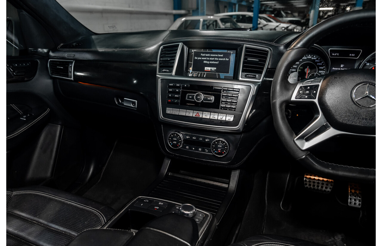 4/2014 Mercedes Benz ML63 AMG (4x4) W166 4d Wagon Diamond White Metallic Twin Turbo V8 5.5L