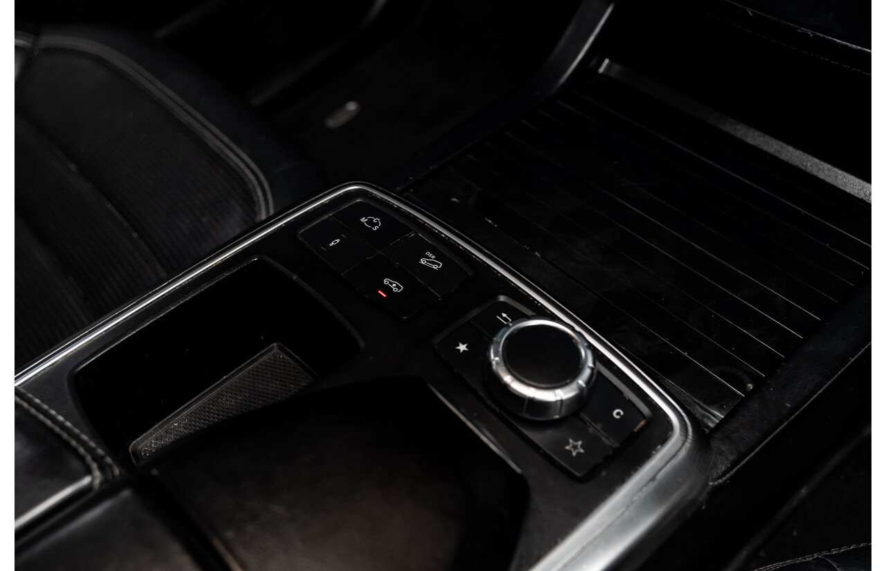 4/2014 Mercedes Benz ML63 AMG (4x4) W166 4d Wagon Diamond White Metallic Twin Turbo V8 5.5L