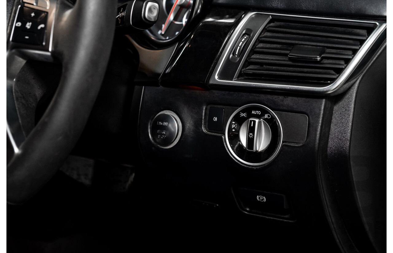 4/2014 Mercedes Benz ML63 AMG (4x4) W166 4d Wagon Diamond White Metallic Twin Turbo V8 5.5L