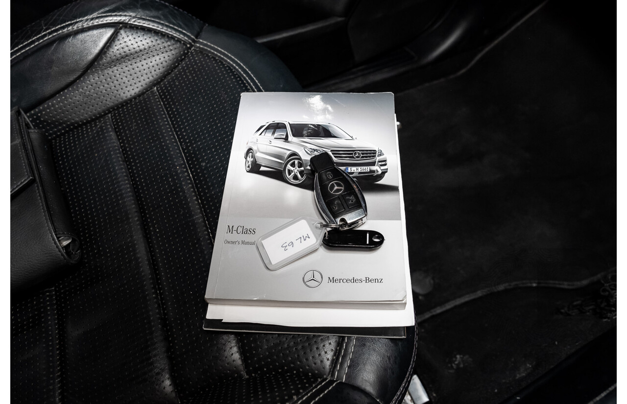 4/2014 Mercedes Benz ML63 AMG (4x4) W166 4d Wagon Diamond White Metallic Twin Turbo V8 5.5L