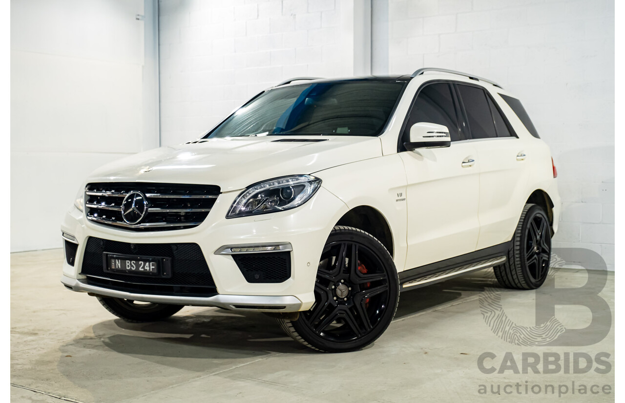 4/2014 Mercedes Benz ML63 AMG (4x4) W166 4d Wagon Diamond White Metallic Twin Turbo V8 5.5L