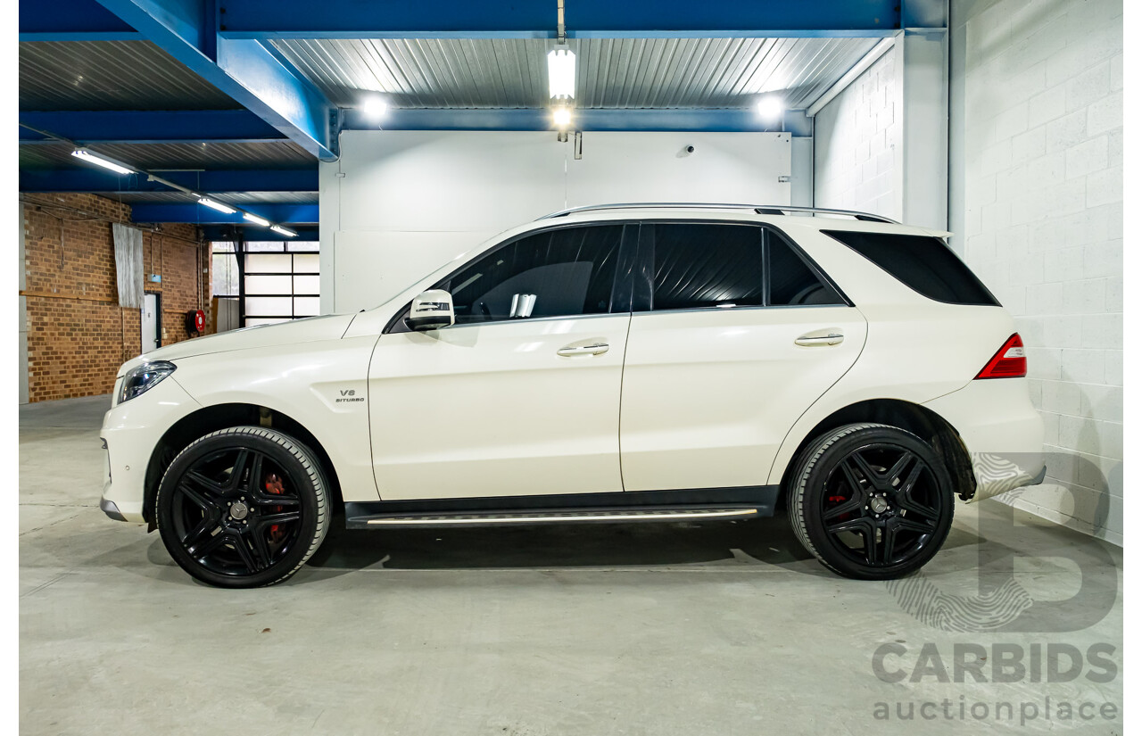 4/2014 Mercedes Benz ML63 AMG (4x4) W166 4d Wagon Diamond White Metallic Twin Turbo V8 5.5L