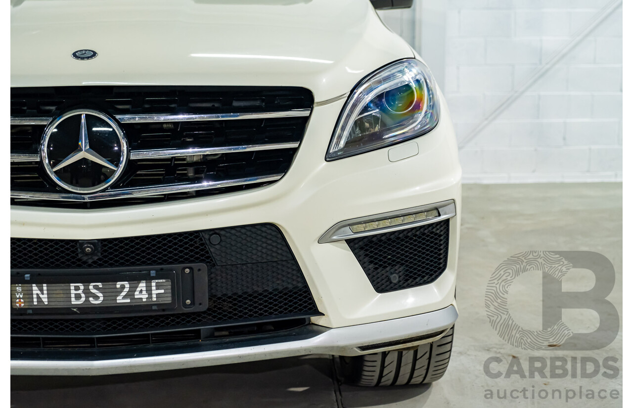 4/2014 Mercedes Benz ML63 AMG (4x4) W166 4d Wagon Diamond White Metallic Twin Turbo V8 5.5L