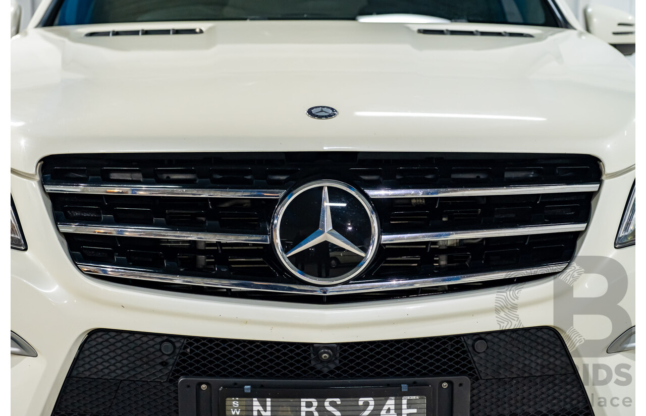 4/2014 Mercedes Benz ML63 AMG (4x4) W166 4d Wagon Diamond White Metallic Twin Turbo V8 5.5L