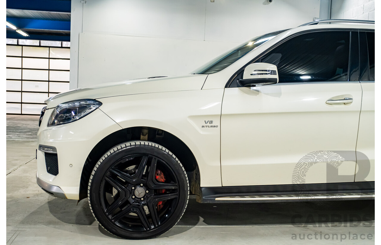 4/2014 Mercedes Benz ML63 AMG (4x4) W166 4d Wagon Diamond White Metallic Twin Turbo V8 5.5L