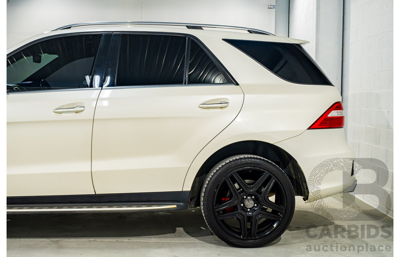 4/2014 Mercedes Benz ML63 AMG (4x4) W166 4d Wagon Diamond White Metallic Twin Turbo V8 5.5L