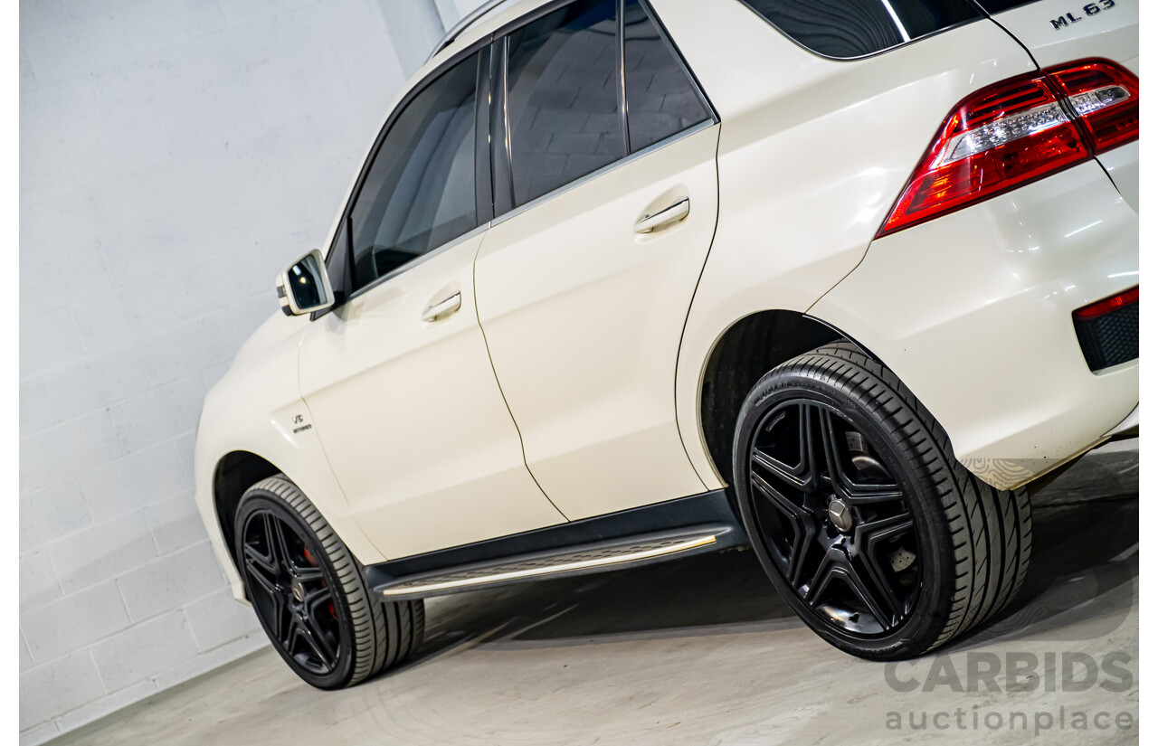 4/2014 Mercedes Benz ML63 AMG (4x4) W166 4d Wagon Diamond White Metallic Twin Turbo V8 5.5L