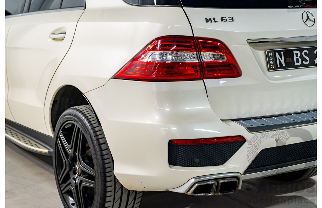 4/2014 Mercedes Benz ML63 AMG (4x4) W166 4d Wagon Diamond White Metallic Twin Turbo V8 5.5L