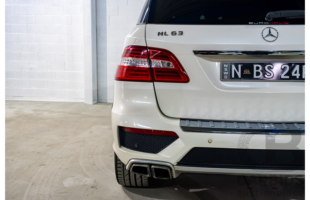 4/2014 Mercedes Benz ML63 AMG (4x4) W166 4d Wagon Diamond White Metallic Twin Turbo V8 5.5L