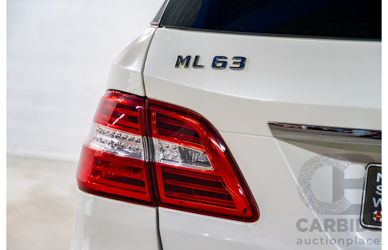 4/2014 Mercedes Benz ML63 AMG (4x4) W166 4d Wagon Diamond White Metallic Twin Turbo V8 5.5L
