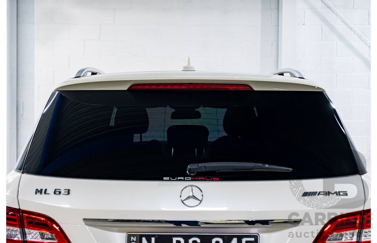 4/2014 Mercedes Benz ML63 AMG (4x4) W166 4d Wagon Diamond White Metallic Twin Turbo V8 5.5L