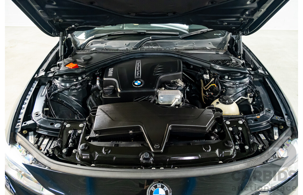 9/2013 BMW 328i Touring F31 4d Wagon Black Sapphire Metallic Turbo 2.0L