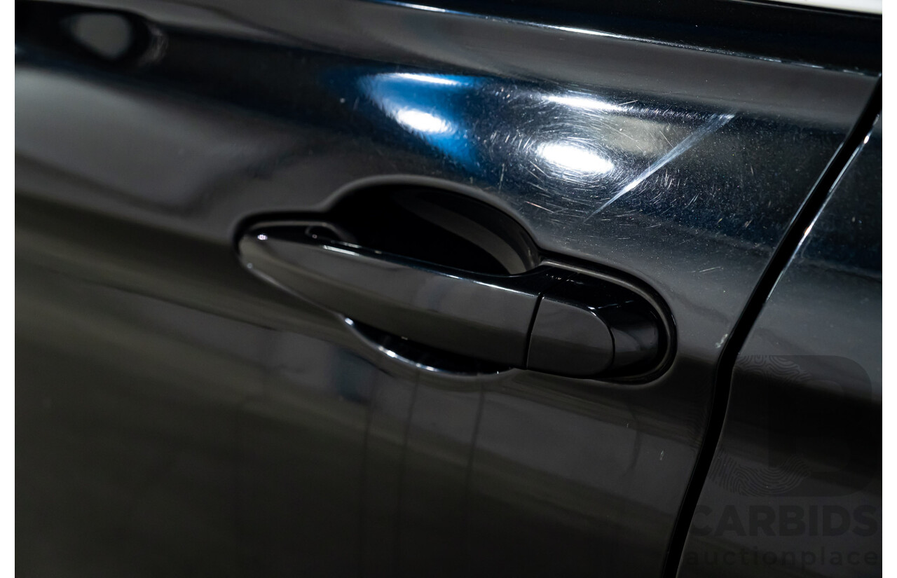 9/2013 BMW 328i Touring F31 4d Wagon Black Sapphire Metallic Turbo 2.0L