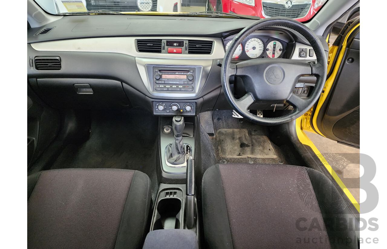 06/2006 Mitsubishi Lancer VR-X FWD CH MY06 4D Sedan Yellow 2.4L