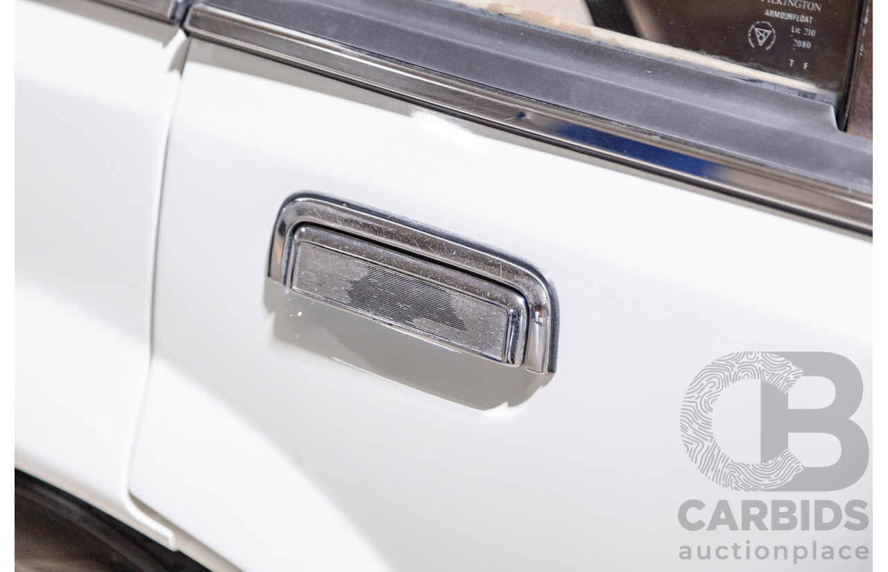 6/1987 Holden Commodore VL Turbo SL BT1 4d Sedan White Turbo 3.0L - Ex-Police - Modified