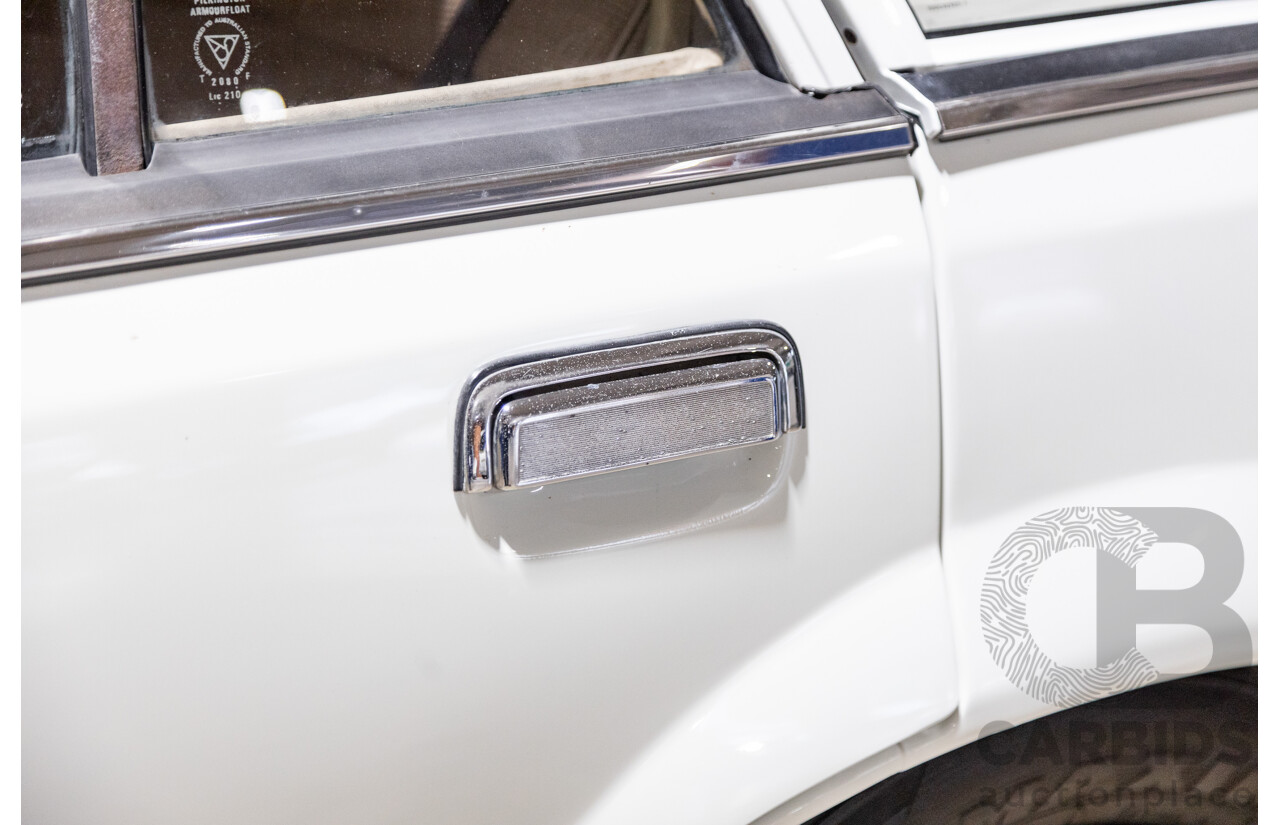 6/1987 Holden Commodore VL Turbo SL BT1 4d Sedan White Turbo 3.0L - Ex-Police - Modified