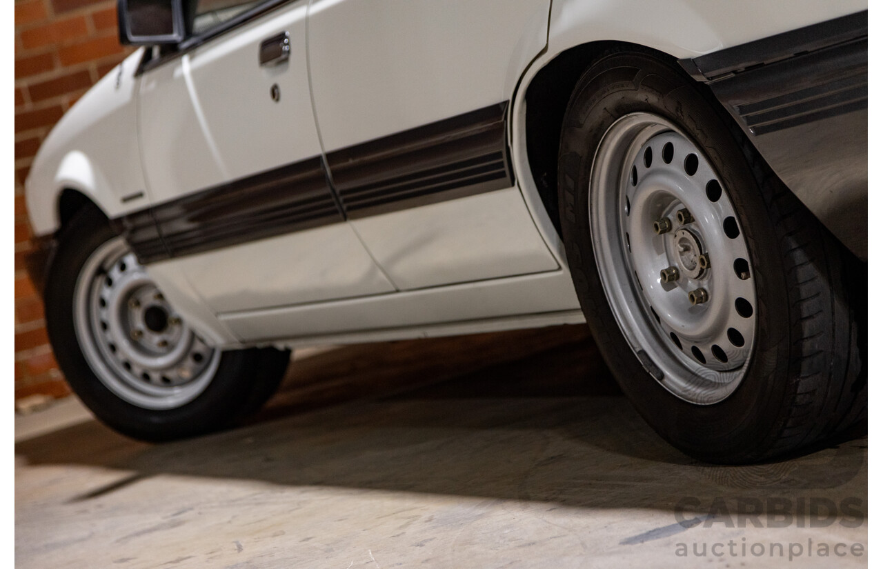 6/1987 Holden Commodore VL Turbo SL BT1 4d Sedan White Turbo 3.0L - Ex-Police - Modified