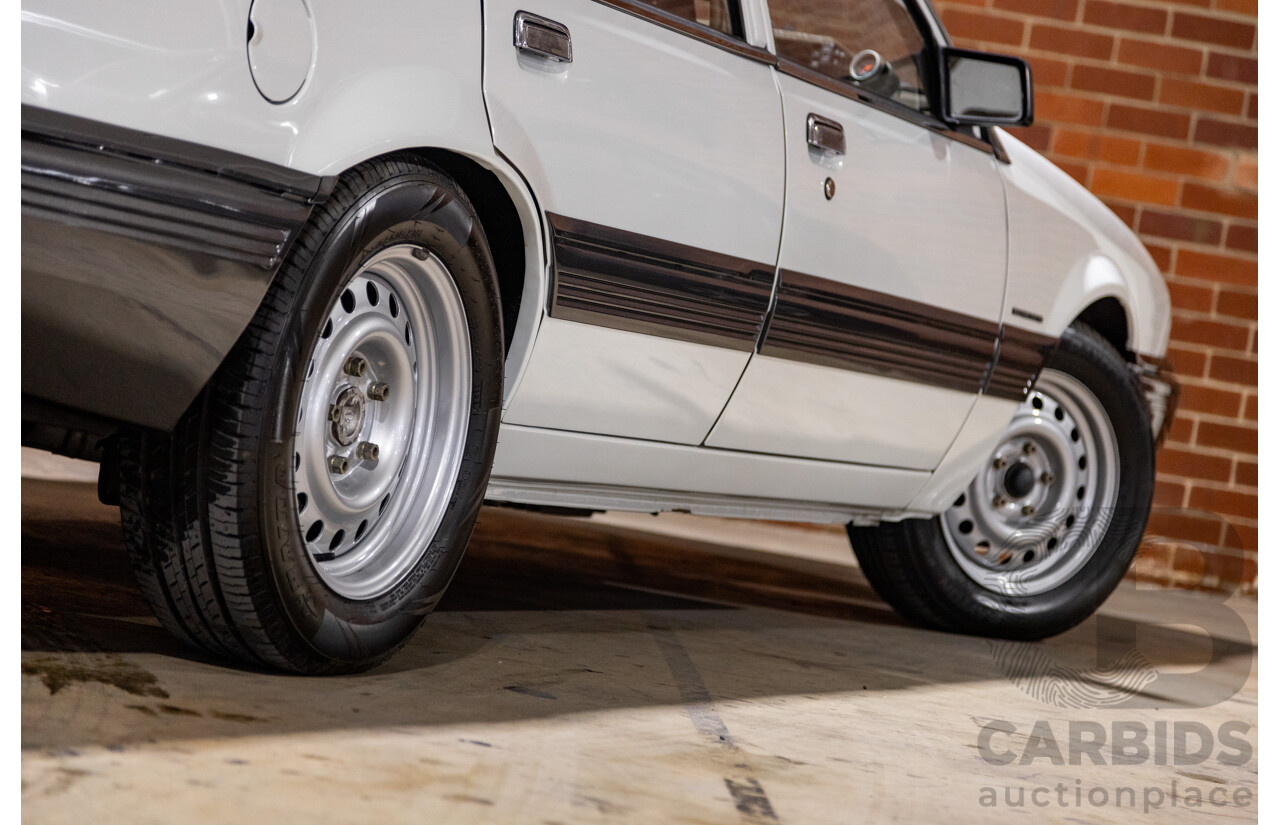 6/1987 Holden Commodore VL Turbo SL BT1 4d Sedan White Turbo 3.0L - Ex-Police - Modified