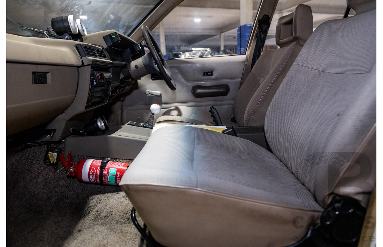 6/1987 Holden Commodore VL Turbo SL BT1 4d Sedan White Turbo 3.0L - Ex-Police - Modified