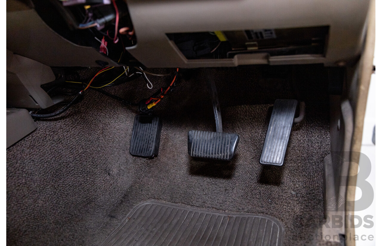 6/1987 Holden Commodore VL Turbo SL BT1 4d Sedan White Turbo 3.0L - Ex-Police - Modified