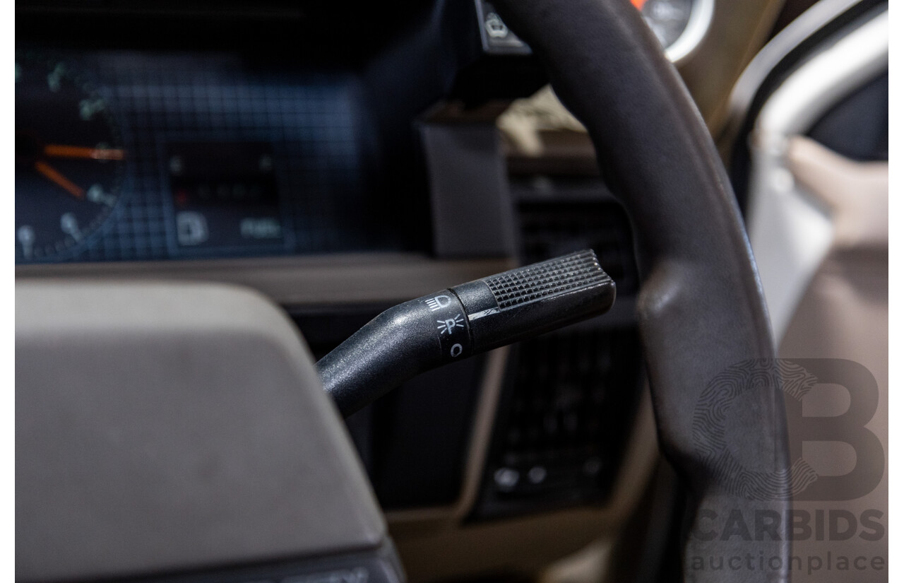 6/1987 Holden Commodore VL Turbo SL BT1 4d Sedan White Turbo 3.0L - Ex-Police - Modified