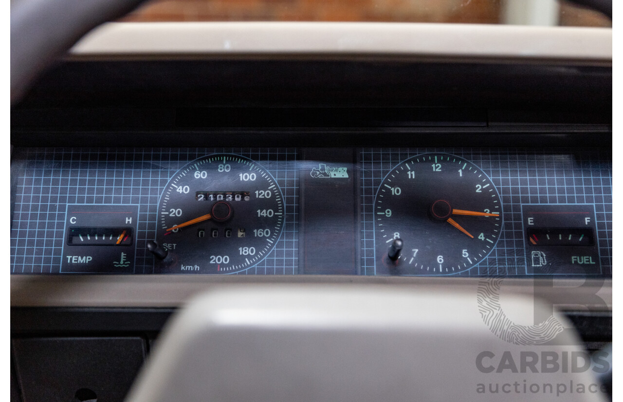 6/1987 Holden Commodore VL Turbo SL BT1 4d Sedan White Turbo 3.0L - Ex-Police - Modified