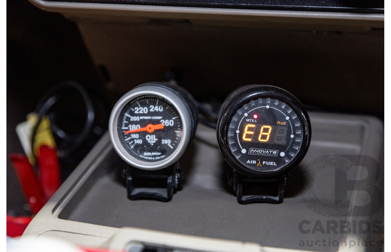 6/1987 Holden Commodore VL Turbo SL BT1 4d Sedan White Turbo 3.0L - Ex-Police - Modified