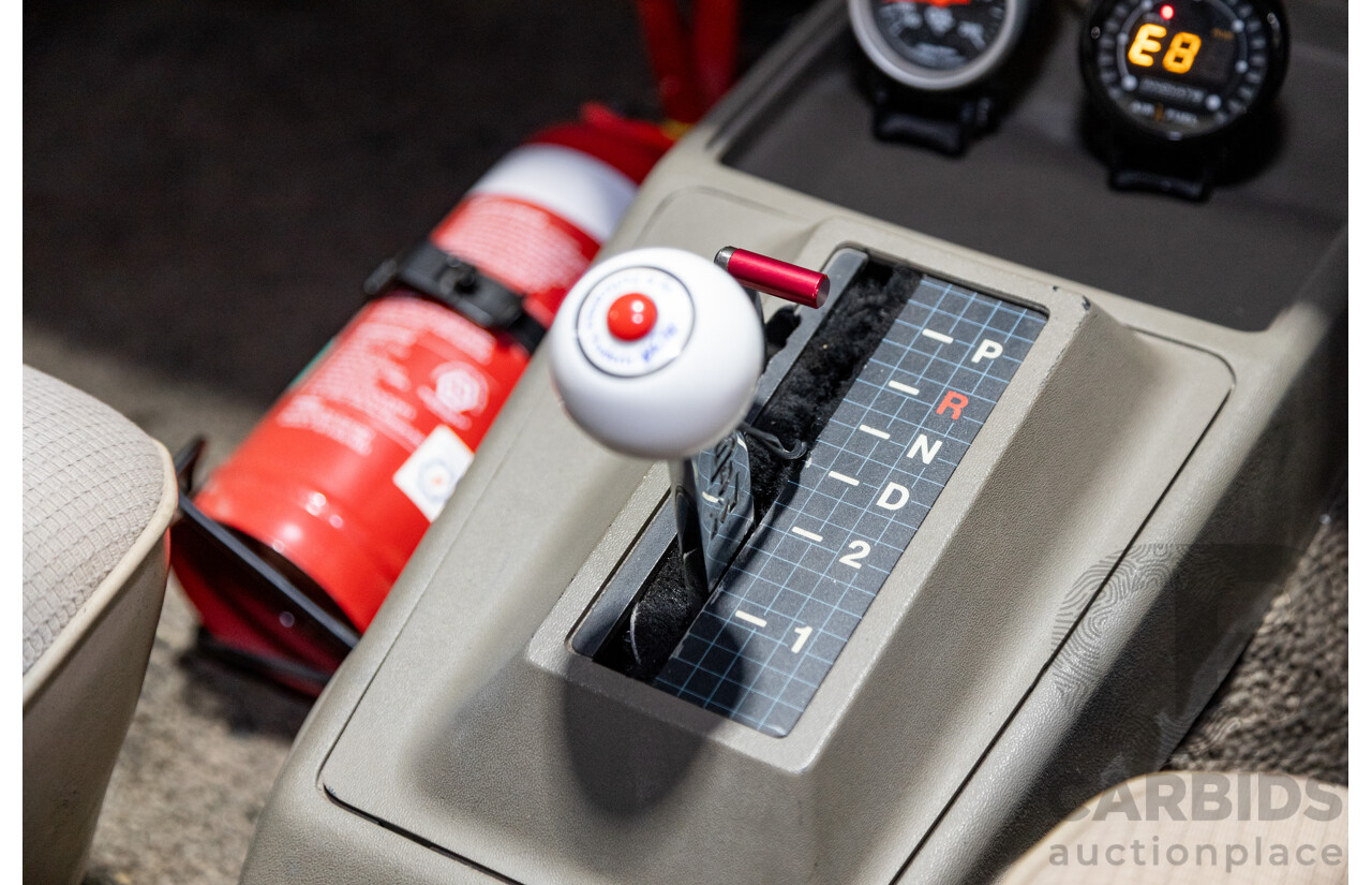 6/1987 Holden Commodore VL Turbo SL BT1 4d Sedan White Turbo 3.0L - Ex-Police - Modified