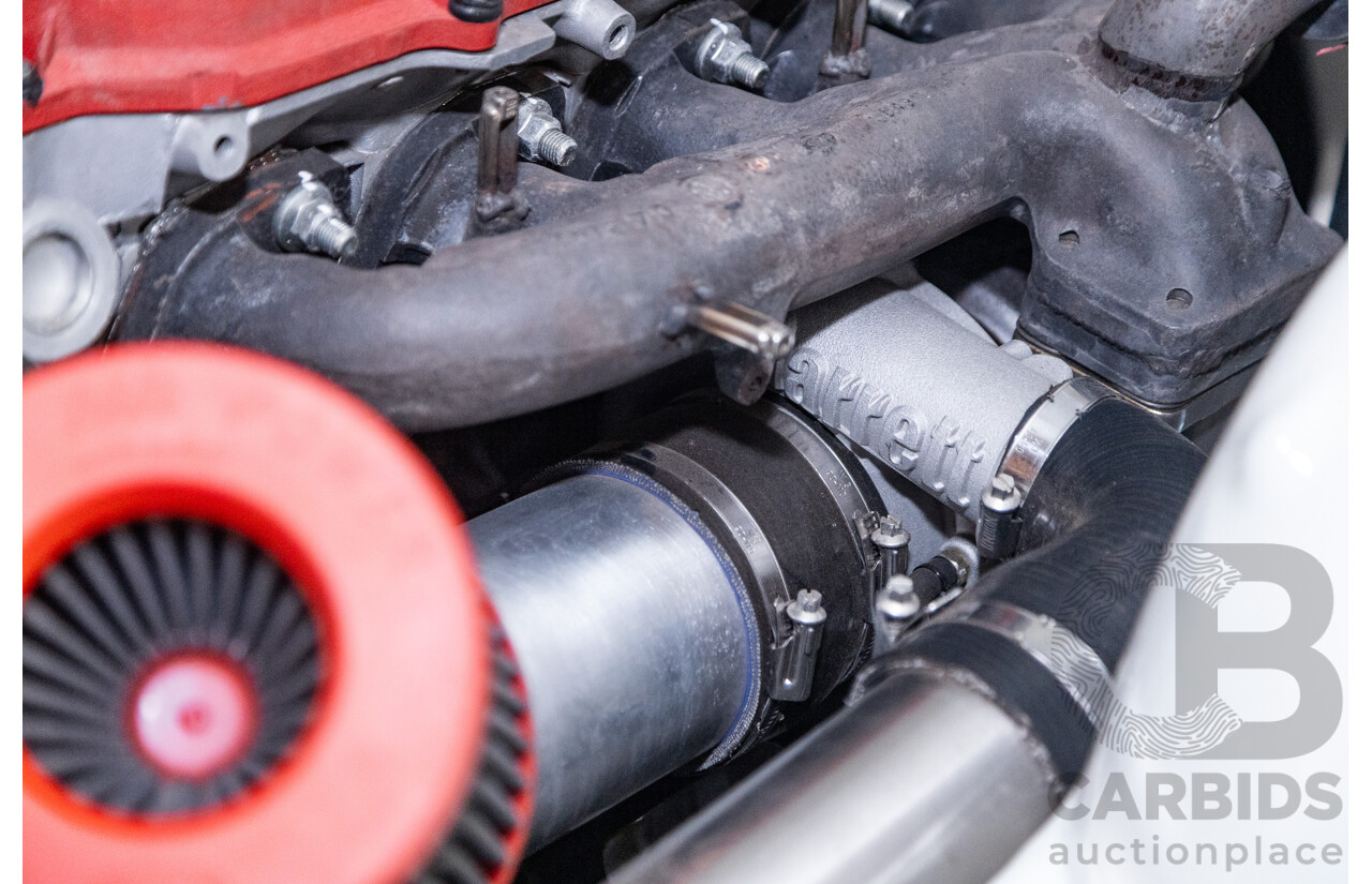 6/1987 Holden Commodore VL Turbo SL BT1 4d Sedan White Turbo 3.0L - Ex-Police - Modified