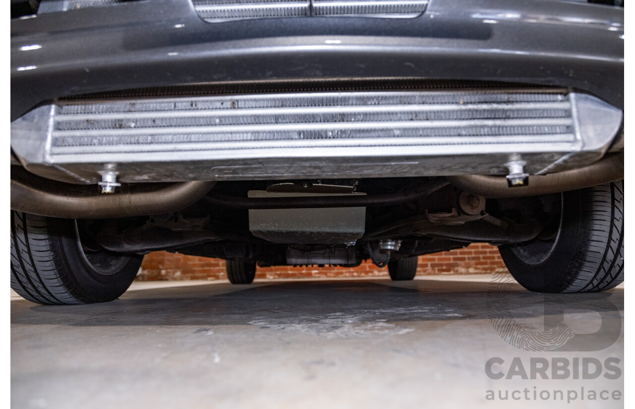 6/1987 Holden Commodore VL Turbo SL BT1 4d Sedan White Turbo 3.0L - Ex-Police - Modified