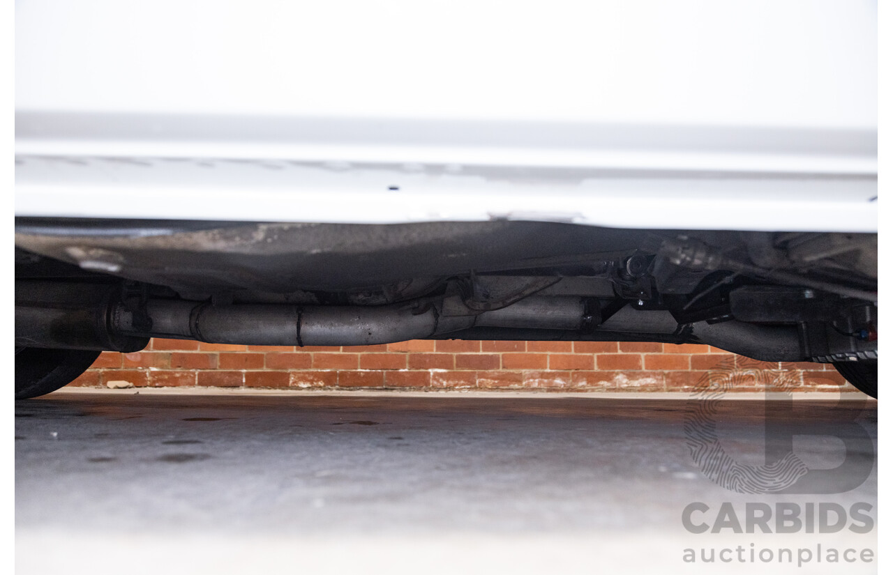 6/1987 Holden Commodore VL Turbo SL BT1 4d Sedan White Turbo 3.0L - Ex-Police - Modified