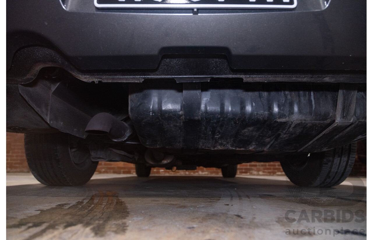 6/1987 Holden Commodore VL Turbo SL BT1 4d Sedan White Turbo 3.0L - Ex-Police - Modified