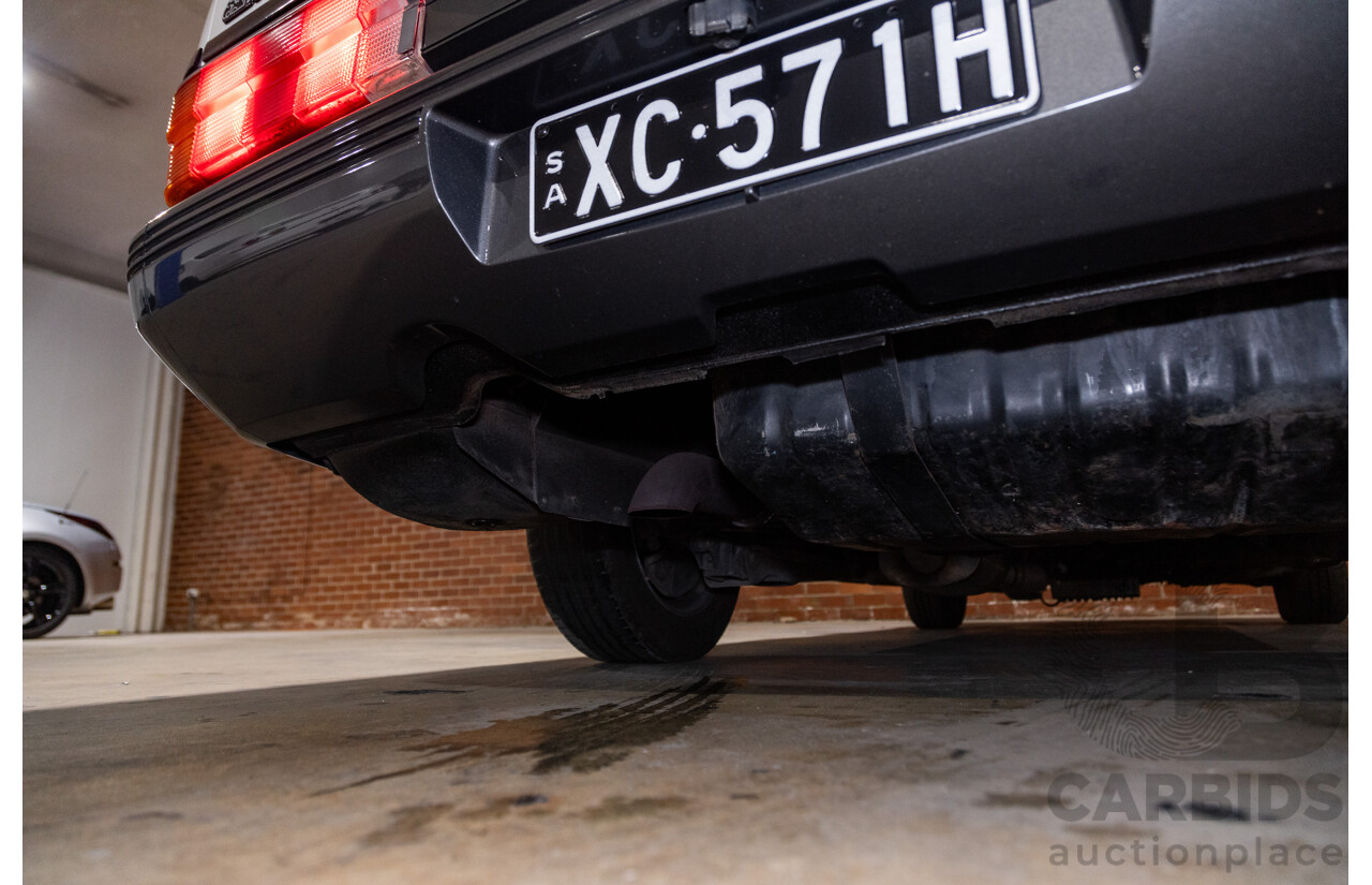 6/1987 Holden Commodore VL Turbo SL BT1 4d Sedan White Turbo 3.0L - Ex-Police - Modified