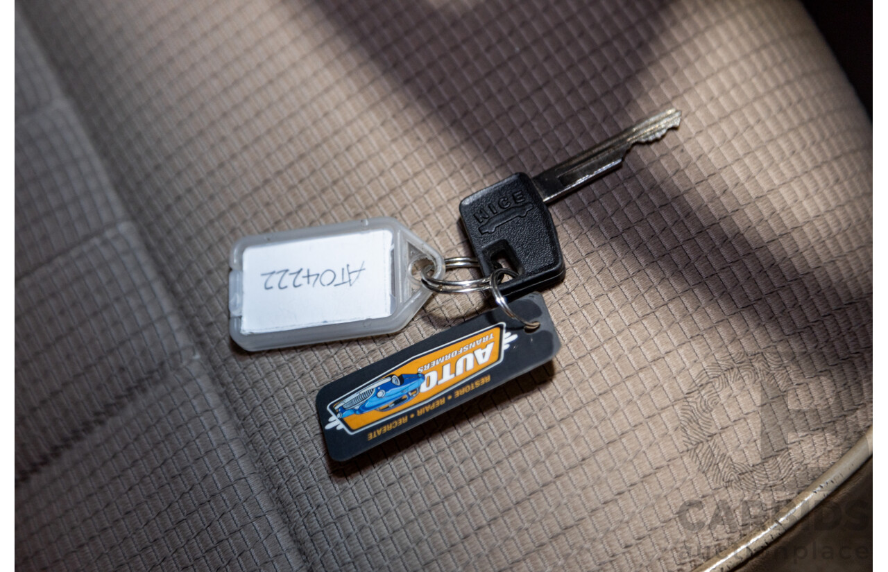 6/1987 Holden Commodore VL Turbo SL BT1 4d Sedan White Turbo 3.0L - Ex-Police - Modified