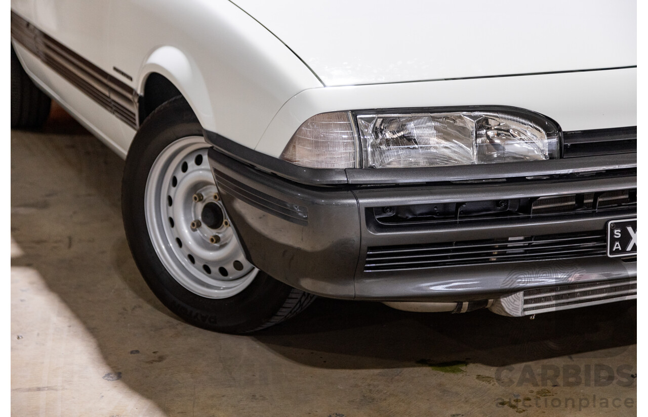 6/1987 Holden Commodore VL Turbo SL BT1 4d Sedan White Turbo 3.0L - Ex-Police - Modified