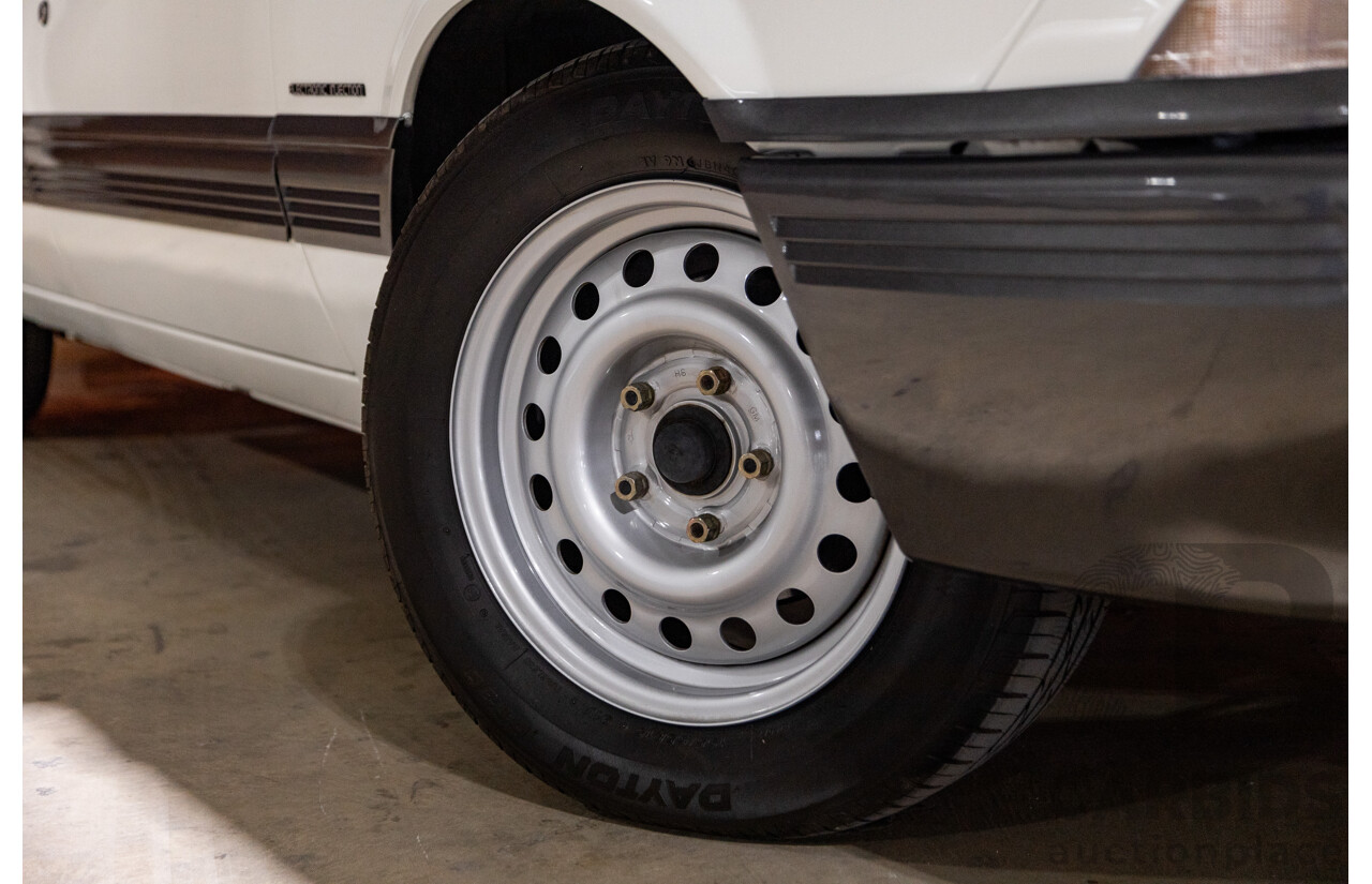 6/1987 Holden Commodore VL Turbo SL BT1 4d Sedan White Turbo 3.0L - Ex-Police - Modified