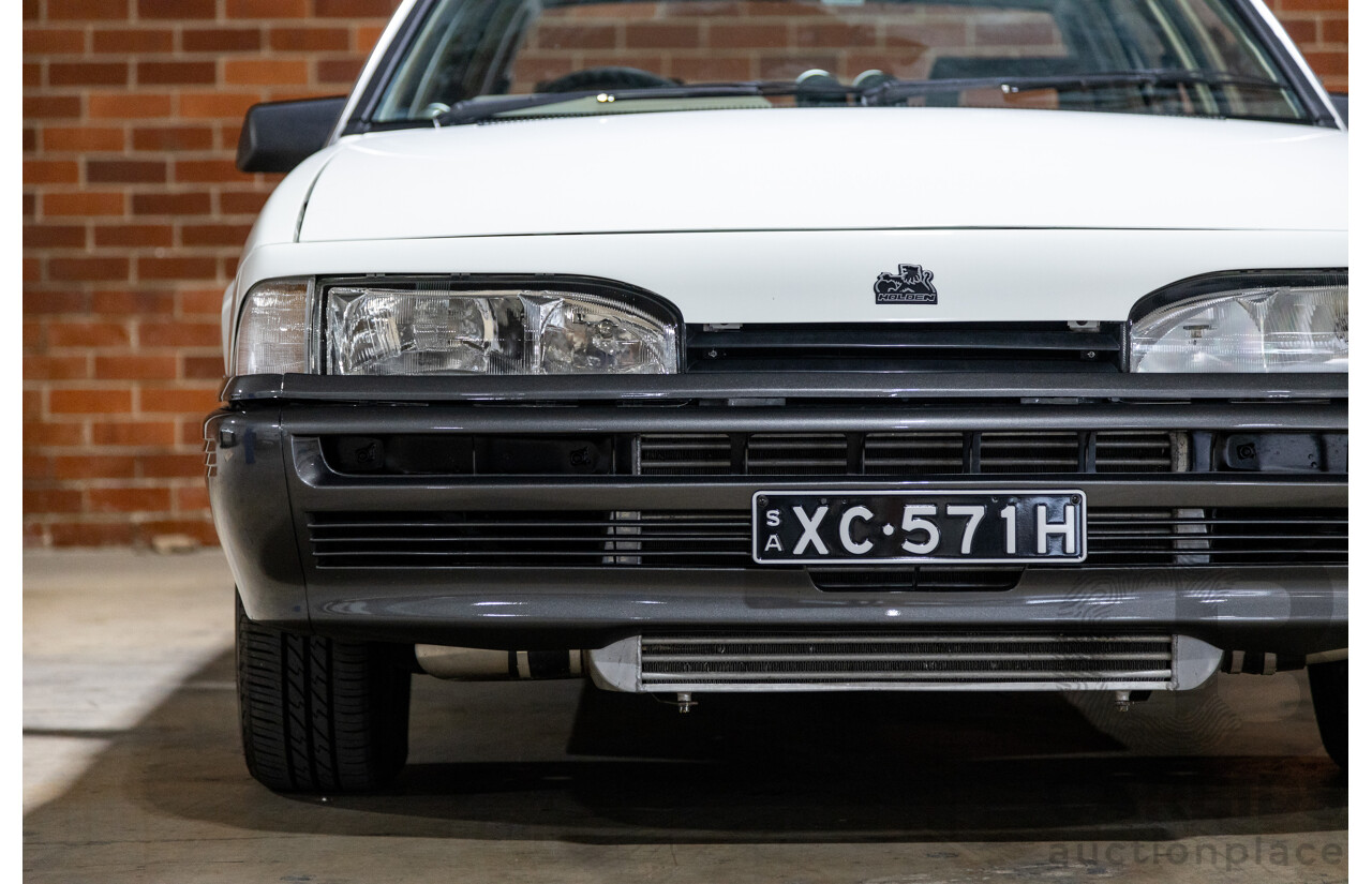 6/1987 Holden Commodore VL Turbo SL BT1 4d Sedan White Turbo 3.0L - Ex-Police - Modified