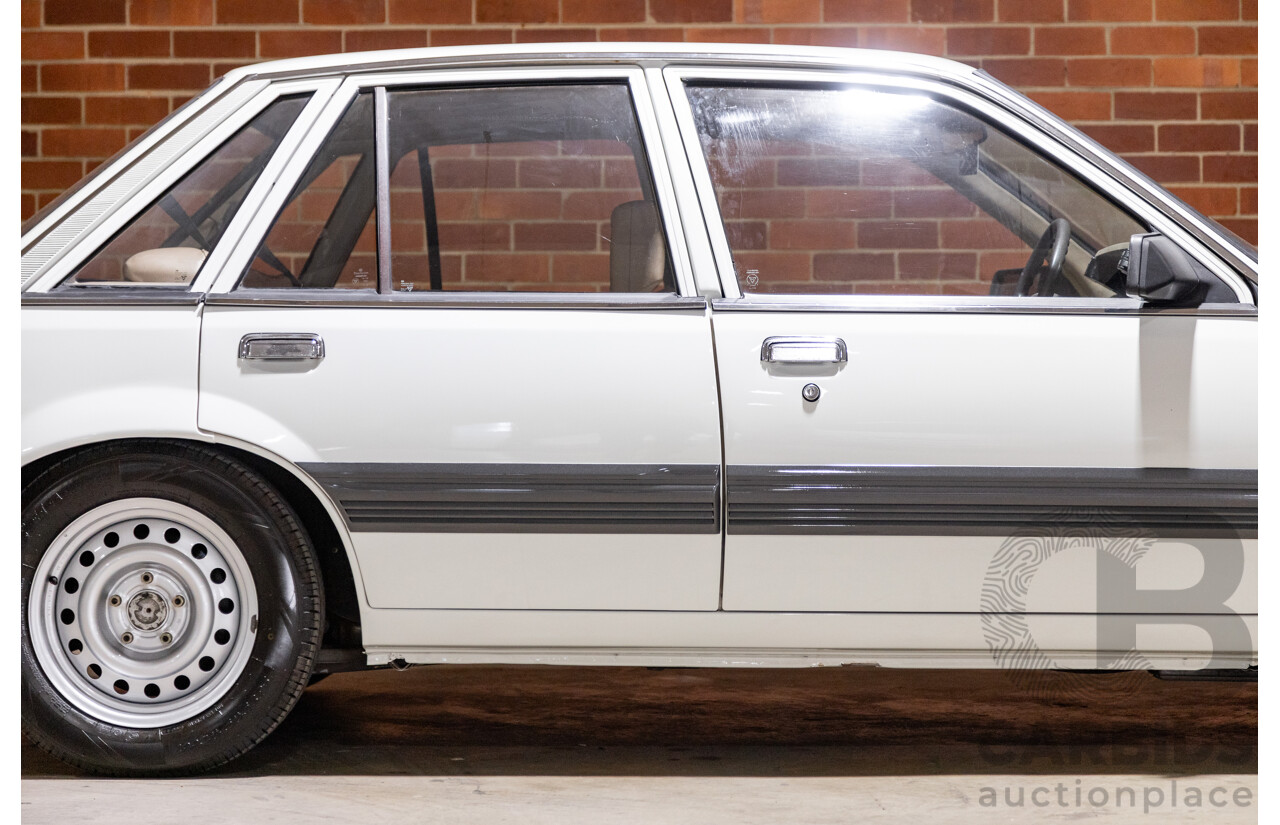 6/1987 Holden Commodore VL Turbo SL BT1 4d Sedan White Turbo 3.0L - Ex-Police - Modified