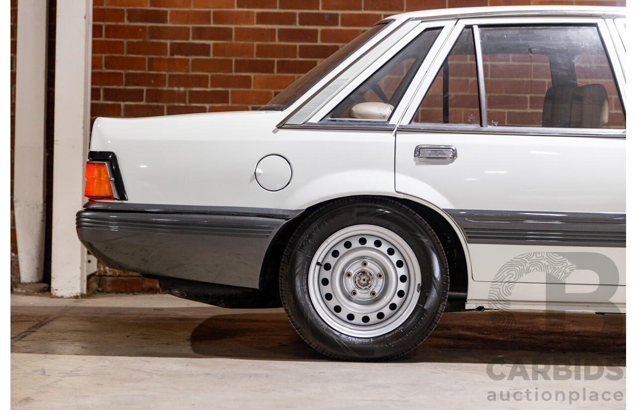 6/1987 Holden Commodore VL Turbo SL BT1 4d Sedan White Turbo 3.0L - Ex-Police - Modified