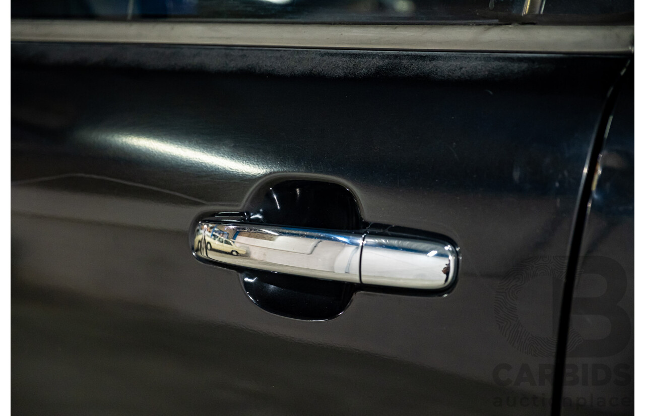 9/2012 Ford Ranger XLT 3.2 (4x4) PX Dual Cab Utility Black Turbo Diesel 3.2L