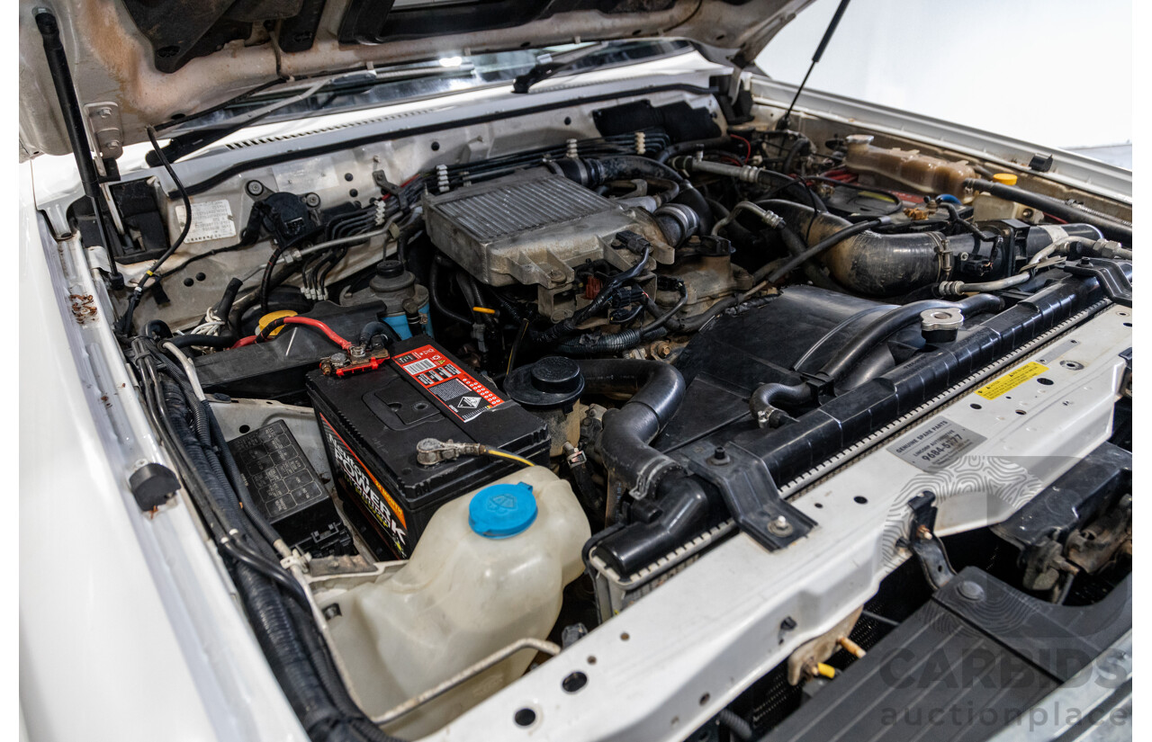 10/2004 Nissan Patrol ST (4x4) GU IV 4d Wagon White Turbo Diesel 3.0L