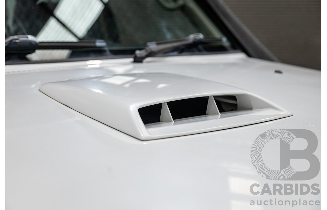 10/2004 Nissan Patrol ST (4x4) GU IV 4d Wagon White Turbo Diesel 3.0L