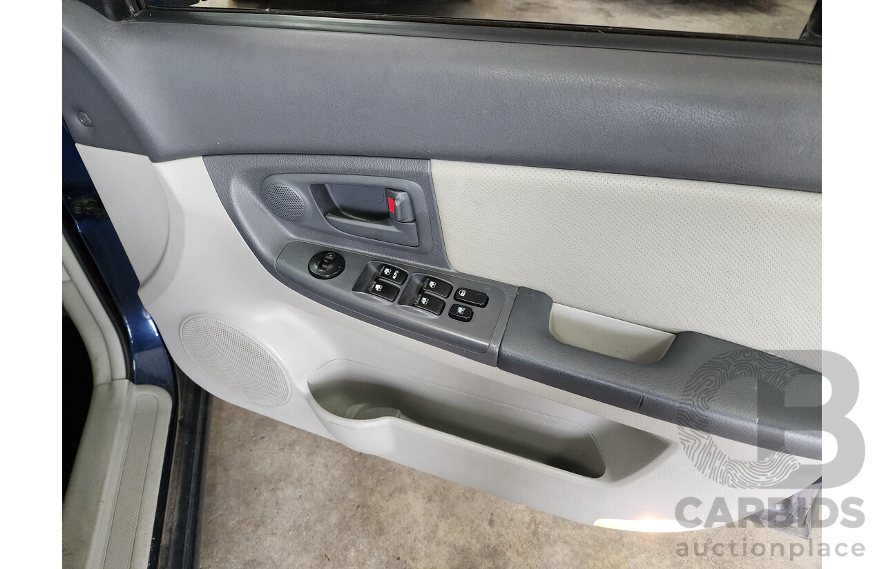 02/2006 Kia Cerato  FWD LD 4D Sedan Blue 2.0L