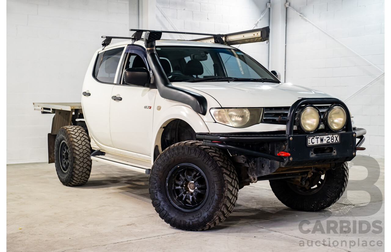 10/2014 Mitsubishi Triton Glx-R (4x4) MN MY14 Update 4d Double Cab Utility White Turbo Diesel 2.5L