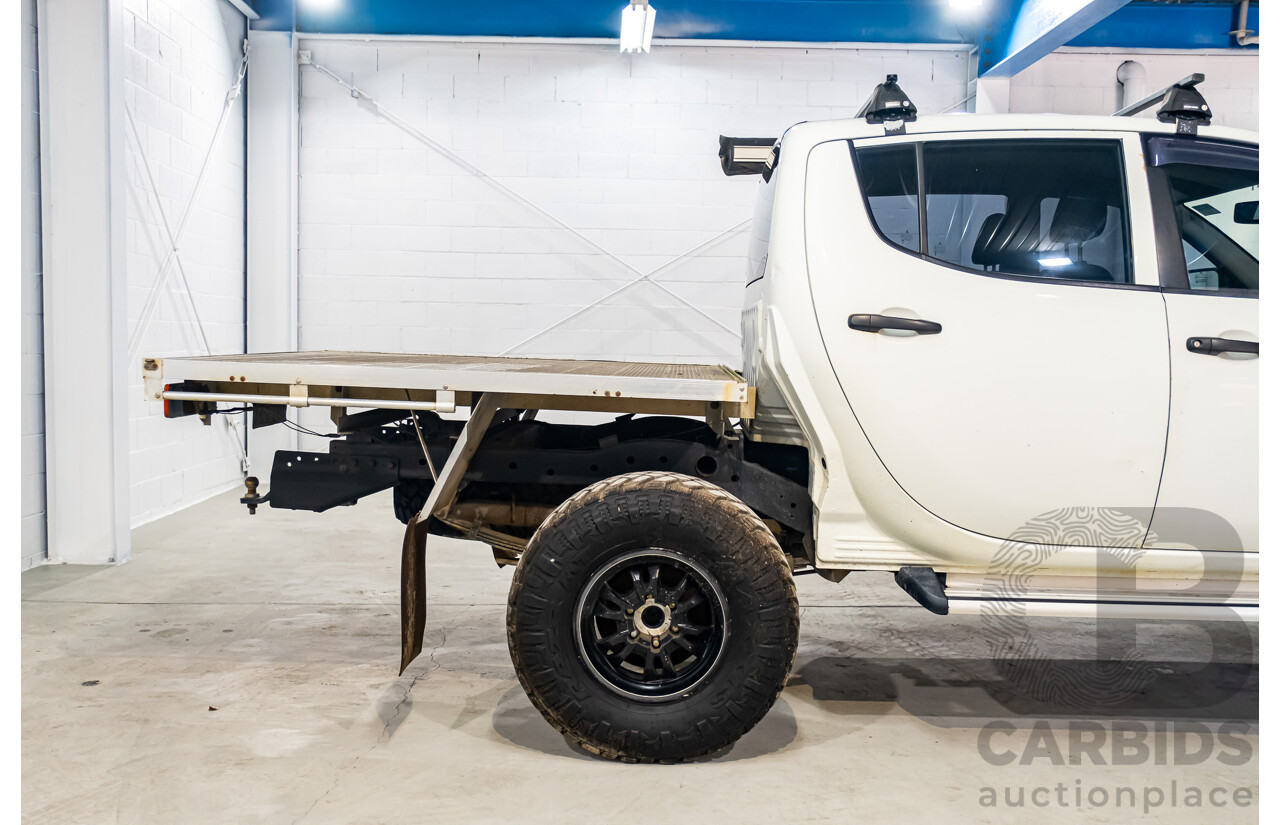 10/2014 Mitsubishi Triton Glx-R (4x4) MN MY14 Update 4d Double Cab Utility White Turbo Diesel 2.5L