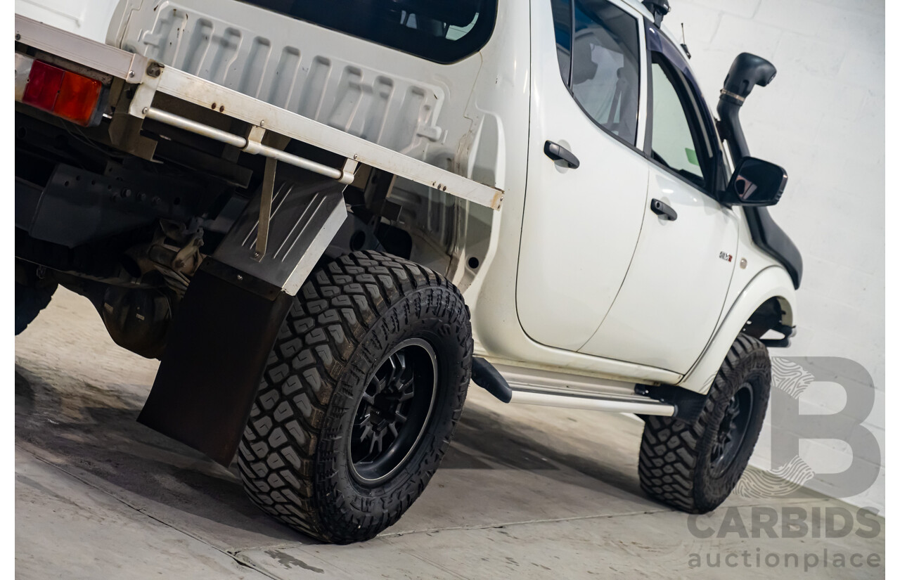 10/2014 Mitsubishi Triton Glx-R (4x4) MN MY14 Update 4d Double Cab Utility White Turbo Diesel 2.5L