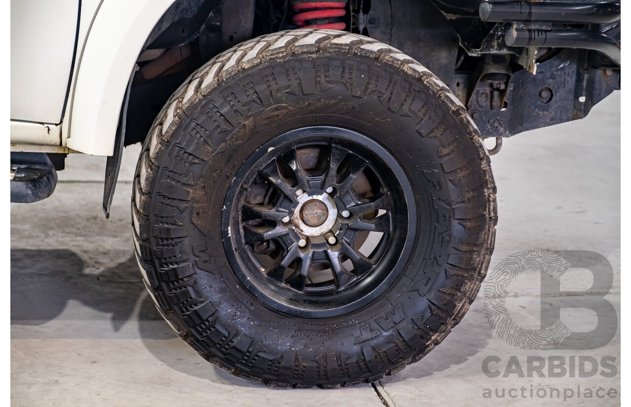 10/2014 Mitsubishi Triton Glx-R (4x4) MN MY14 Update 4d Double Cab Utility White Turbo Diesel 2.5L